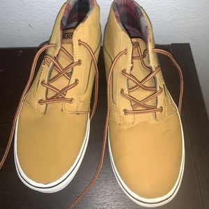 Can mustard color mid top shoes